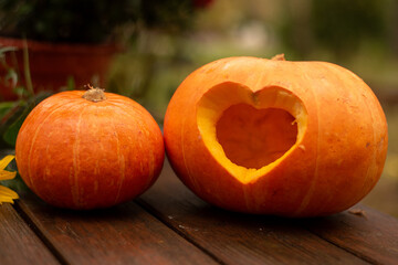 Heart-Shaped Carving in Pumpkin with Cozy Autumn Vibes