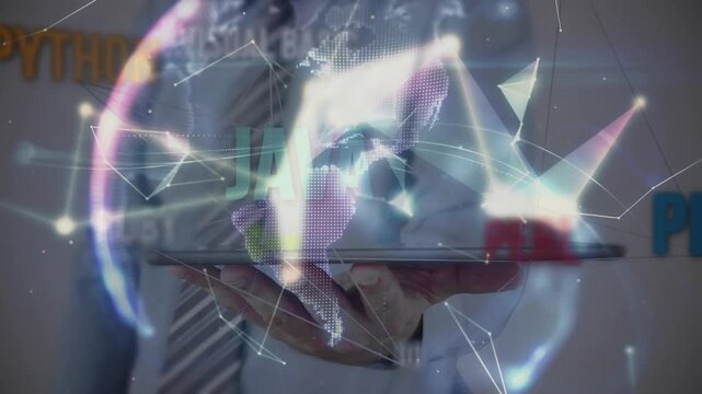Businessman tapping tablet screen showcasing animated globe with programming labels in tech demo