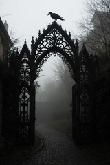 Generative AI Gothic Gate with Raven in Fog Silhouette Architecture Ornate Iron Cobblestone Path Mist Eerie Spooky Ominous Dark Black Mystery Gothic horror Halloween - Download Now