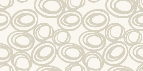 Seamless abstract vector pattern with hand drawn circle shapes in soft tones a light background. Pastel and modern design, perfect for textiles, packaging, wallpapers, and trendy print projects.