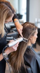 Fototapeta premium stylist applying keratin-bonded hair extensions on clientâ€™s scalp using heat tool, modern salon setting, focus on process 