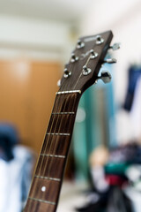 The headstock of classical acoustic guitar. Close up