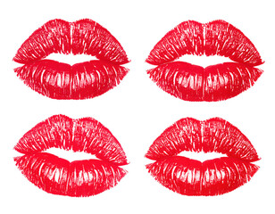 Obraz premium Four red lipstick kiss marks arranged in a grid pattern, showcasing lip texture and shape.