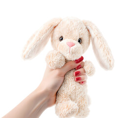Fototapeta premium Cute plush bunny held in a child's hand
