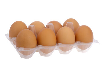 Brown eggs in clear plastic carton isolated on a transparent background oval food