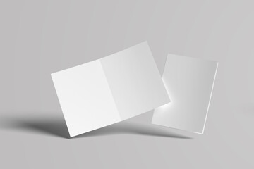 Blank open brochures on grey background