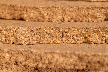 material that is obtained from the bark of a cork tree, closeup, side view