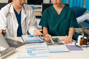 Medical team working on digital tablet healthcare doctor technology tablet using computer analyzed the results of medical reports