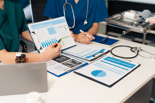 Medical team working on digital tablet healthcare doctor technology tablet using computer analyzed the results of medical reports - Powered by Adobe