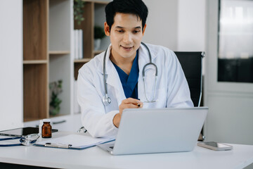 Medical students working with tablets and hospital documents