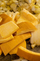 peel from a pumpkin, inedible part of the peel of a ripe pumpkin on the table