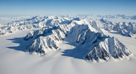 Fototapeta premium Majestic snow-covered mountain range in vast arctic wilderness