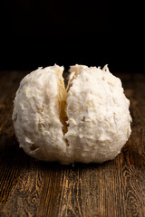 yellow juicy citrus fruit peeled, pieces of delicious and sweet citrus fruit while preparing it for eating