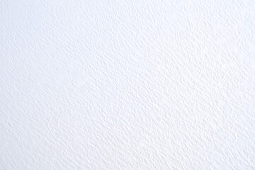 Soft textured background with subtle light and shadow play