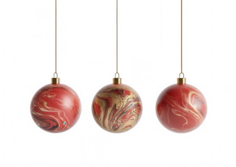 Three red and gold marbled Christmas ornaments hang from thin gold threads against a black background