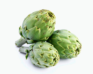 Three fresh artichokes resting on a white background