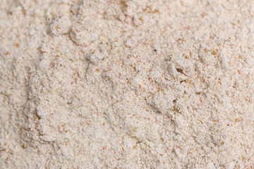 Brown powder textured background. Concept of nutritional supplement, dieting, detox, preventive healthcare and healthy lifestyle.