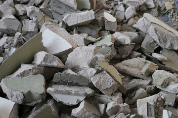 Broken concrete, Piles of lightweight construction bricks after house demolition