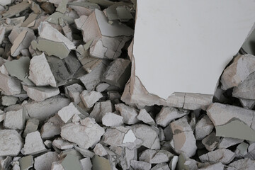 Broken concrete, Piles of lightweight construction bricks after house demolition