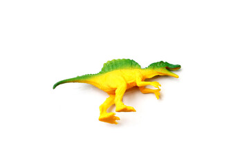 Plastic dinosaur toy on white background
