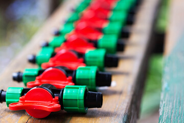 modern parts for collecting drip irrigation for plants in the country, close-up