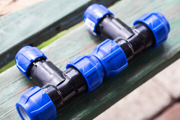 modern parts for collecting drip irrigation for plants in the country, close-up
