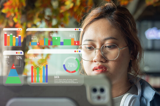 An Asian teenage girl is working on processing data with her tablet in a cafe.
