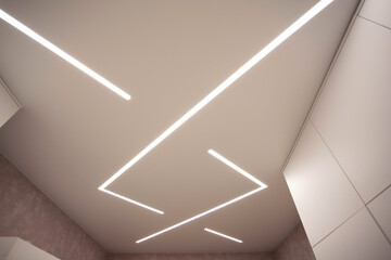 Modern designer stretch ceiling with illuminated LED lines in the room, backlighting