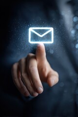 Hand touching digital email icon