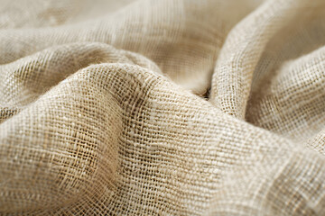Extreme macro of fine linen fabric weave neutral