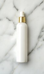 White Cosmetic Bottle with Gold Cap on Marble