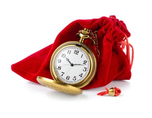 Antique pocket watch in a red velvet pouch