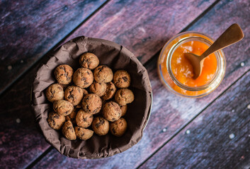 Rustic Bowl of Chocolate Chip Cookies with Juice