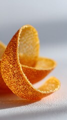 Fresh orange peel forms graceful swirls, capturing the essence of citrus freshness and hinting at the potential for zesty summer detox drinks, herbal infusions, or flavorful additions to recipes