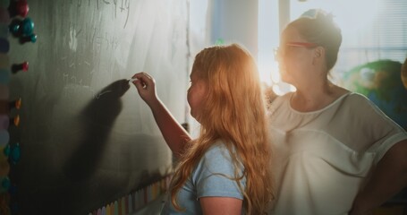 Smart Pupil Showcasing Math Knowledge: Static Shot of Elementary School Girl Solving Mathematical...