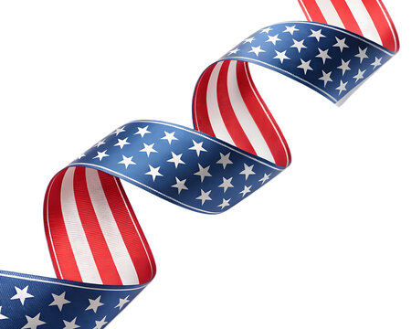 American flag ribbon swirling diagonally against a black background in a patriotic display