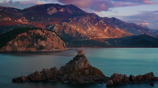 Small St. Nedjelja Church on rocky Islet near Petrovac city in Montenegro