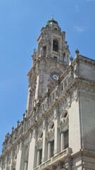Fototapeta premium View of Porto City Hall (Câmara Municipal do Porto), located in Avenida dos Aliados, Portugal, under clear summer skies. A landmark of civic pride and neoclassical architecture. Close up