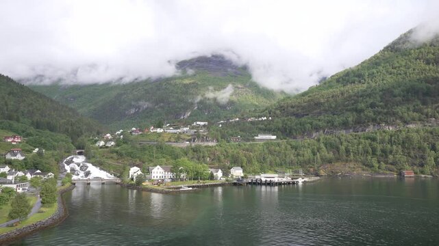 Aerial view of Hellesylt waterfall in Hellesylt with mountains in background, Sunnylvsfjorden, Stranda Municipality, Norway, Scandinavia, Europe