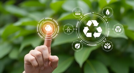 Concept of green technology and environmental conservation. Hand touching a futuristic digital interface with recycling and sustainable energy icons.