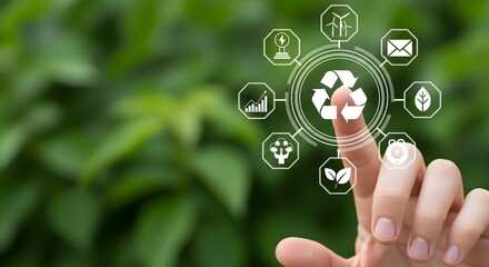 Hand touching a digital interface with a recycling symbol. Concept of circular economy, sustainable business, and green technology innovation.