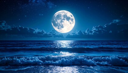Full moon over a dark ocean shore at night