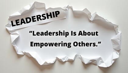 Leadership Concept with Empowering Quote on Crumpled Paper