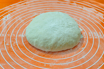Raw Dough Ball on Silicone Pastry Mat