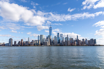 New York City skyline taken from New Jersey in a cold day of december. Sky is blue with few clouds. USA, NYC, NY, Manhattan