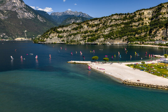 Aerial view of windsurfers and beach in Torbole on Lake Garda, Italy - Powered by Adobe