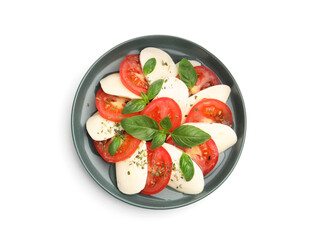 Tasty salad Caprese with mozzarella, tomatoes, basil and spices isolated on white, top view