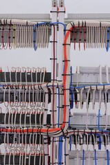 View from the back of the electrical panel. Connection of electronic modules using copper...