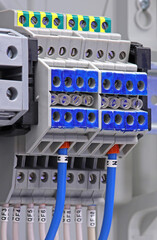 Electrical terminals with connected insulated copper wires with metal lugs. Marking with a thermal...