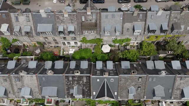 Aerial view of Kartoffelr&aelig;kkerne (English: The Potato Rows), a historic residential area in Copenhagen, Denmark, known for its distinctive rows of 19th-century terraced houses.	
